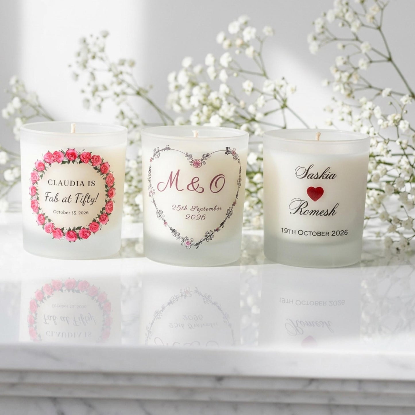 Personalised wedding candle with red rose petals, names and date printed on frosted glass
