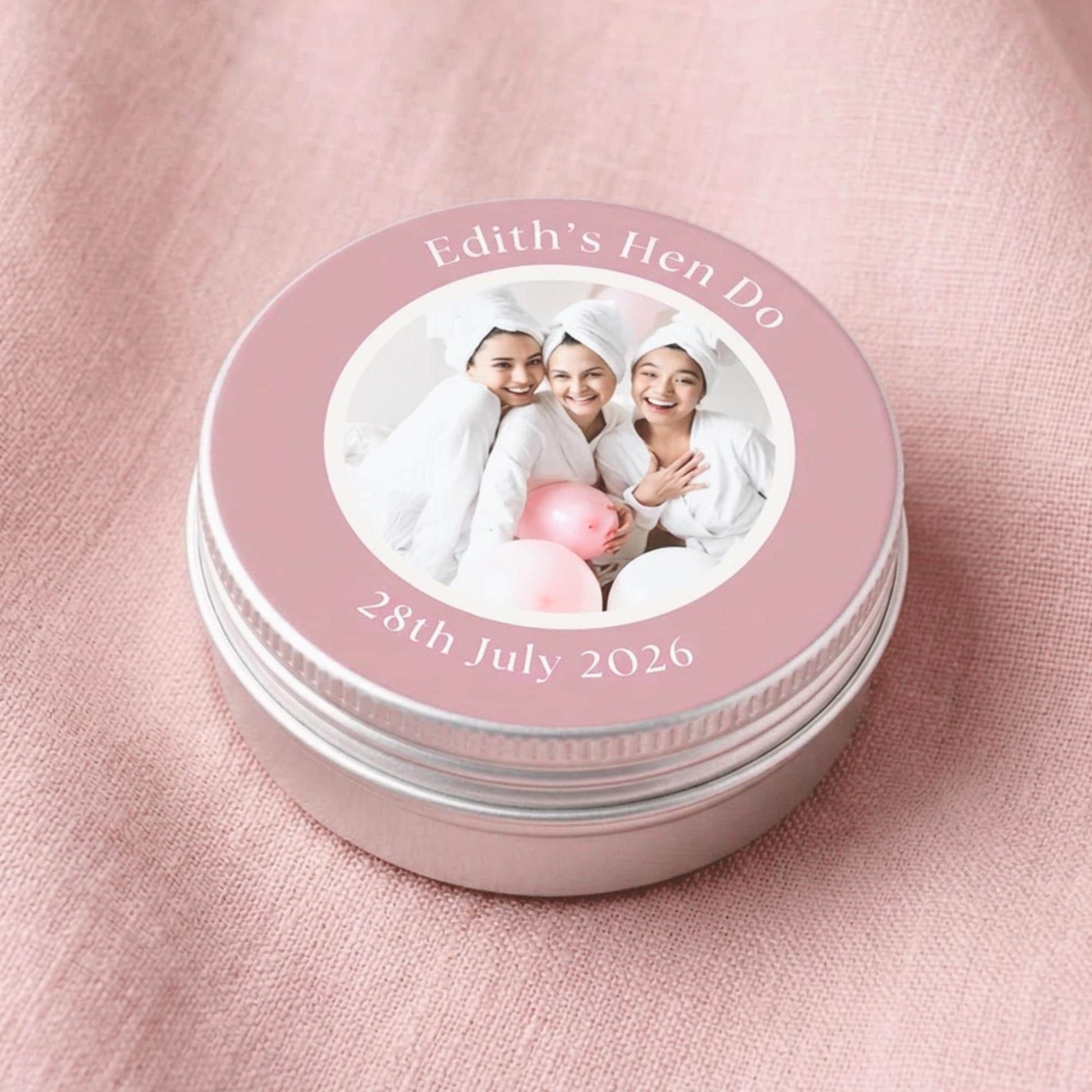 Personalised hen party candle tin favours with photo-printed lids, handmade with natural olive wax in the Cotswolds — perfect hen do party bag gift