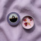 Selection of personalised mini candle tin party favours in different colours — mix and match scents for your celebration