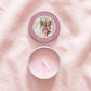 Flat lay of personalised party favour candle tin, lid and tin separated showing colour-printed photo design with custom text, open tin revealing candle and cotton wick