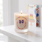 Personalised birthday candle with name and age in balloon numbers printed on frosted glass