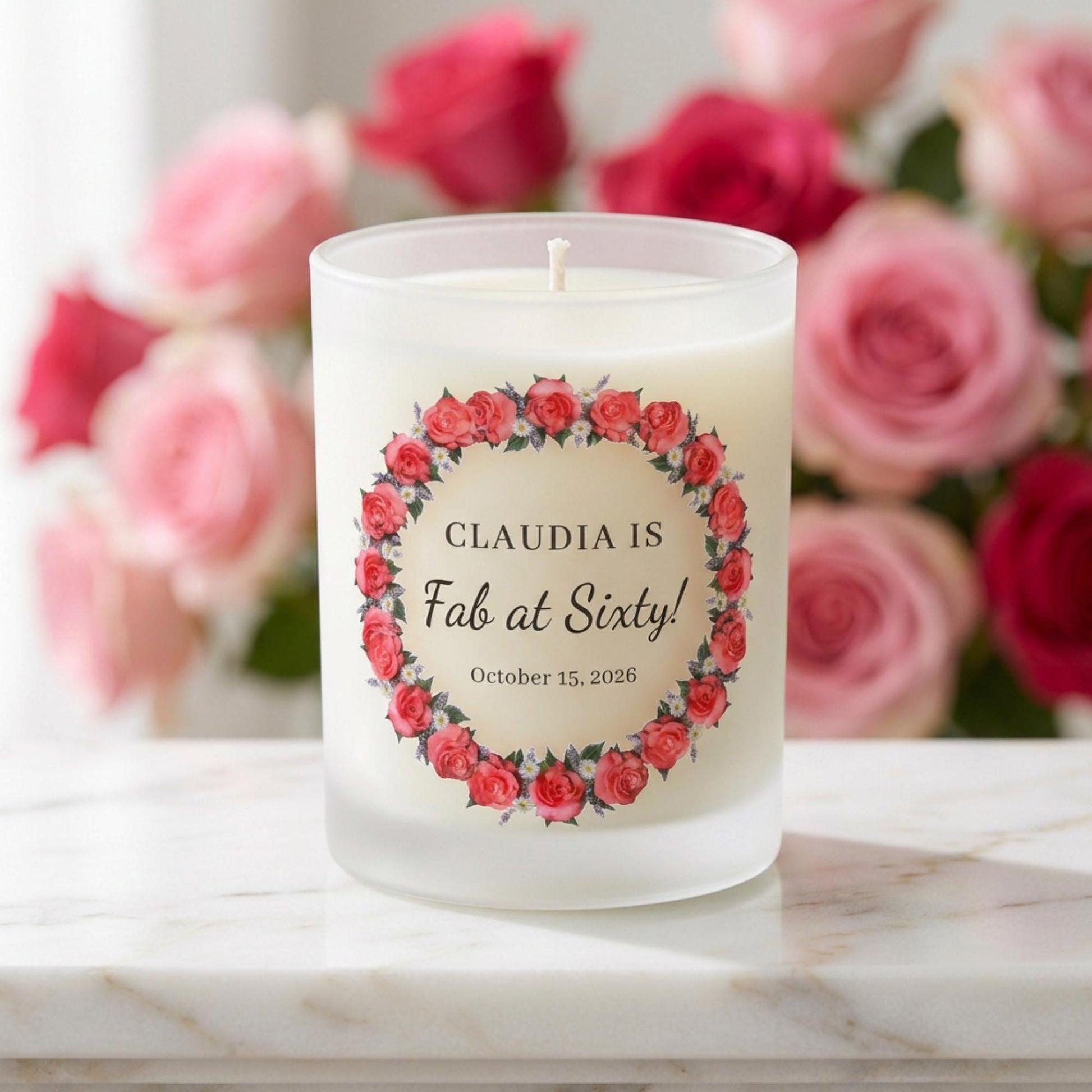 Personalised birthday candle with a rose wreath design and custom wording printed on frosted glass
