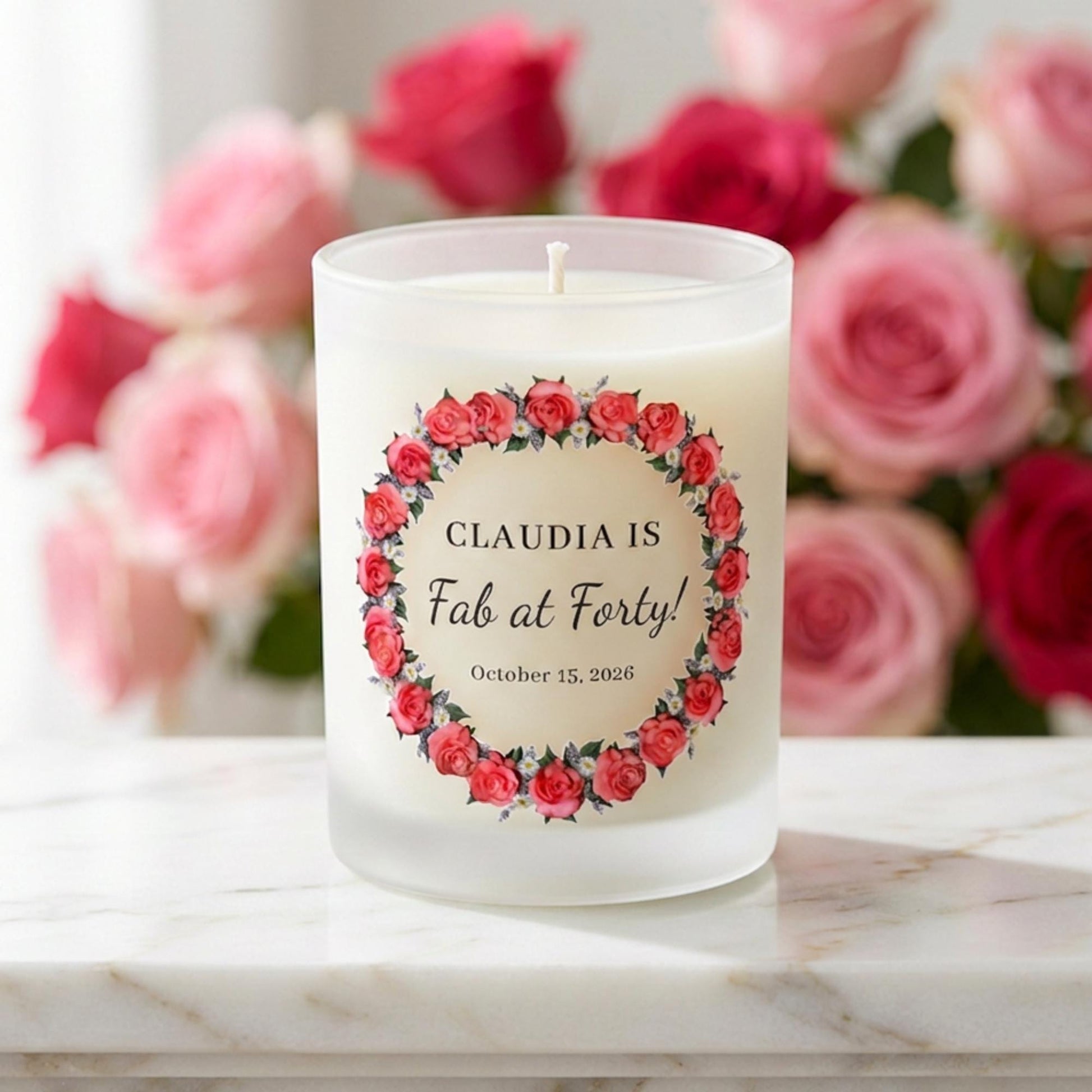Personalised birthday candle with a rose wreath design and custom wording printed on frosted glass