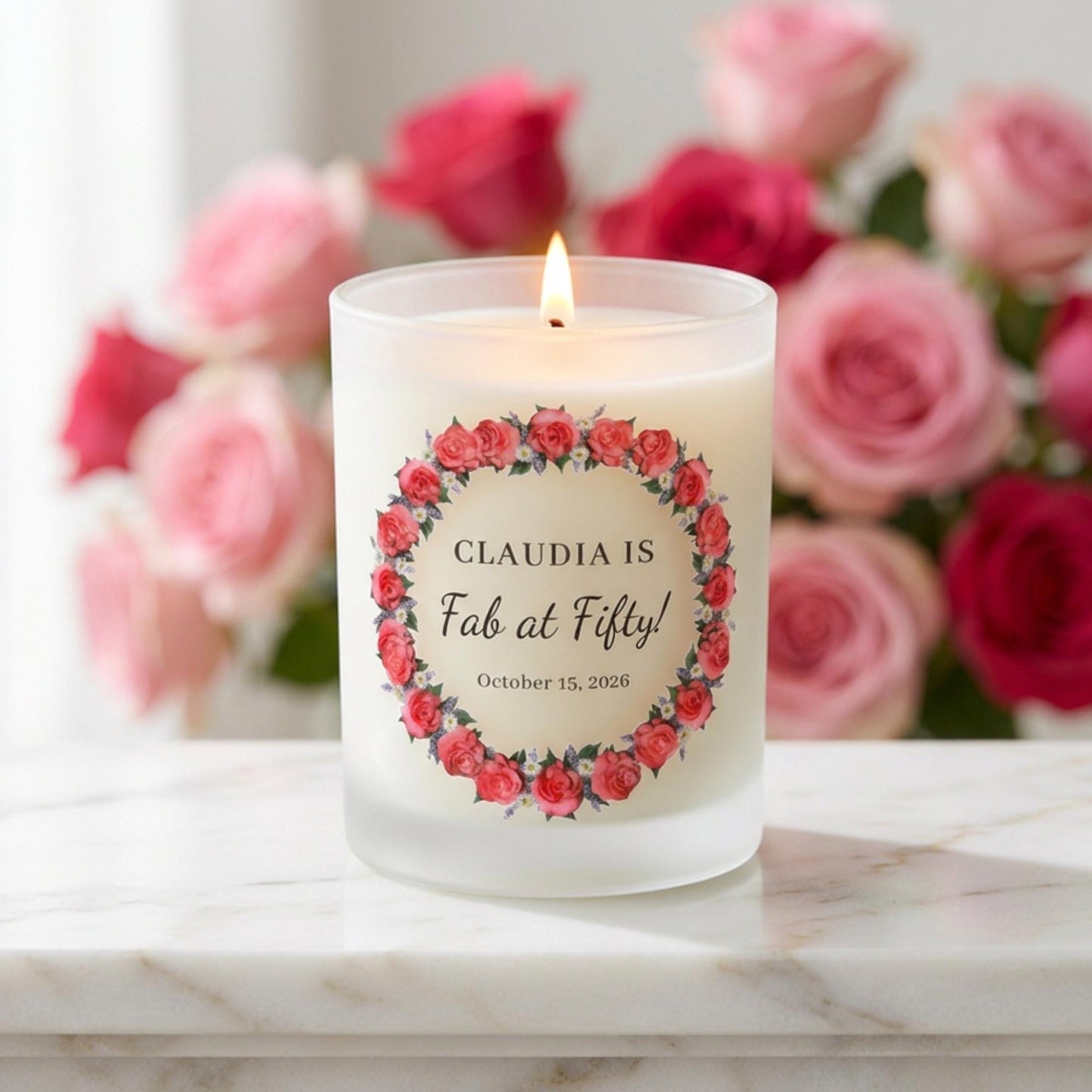 Personalised birthday candle with a rose wreath design and custom wording printed on frosted glass