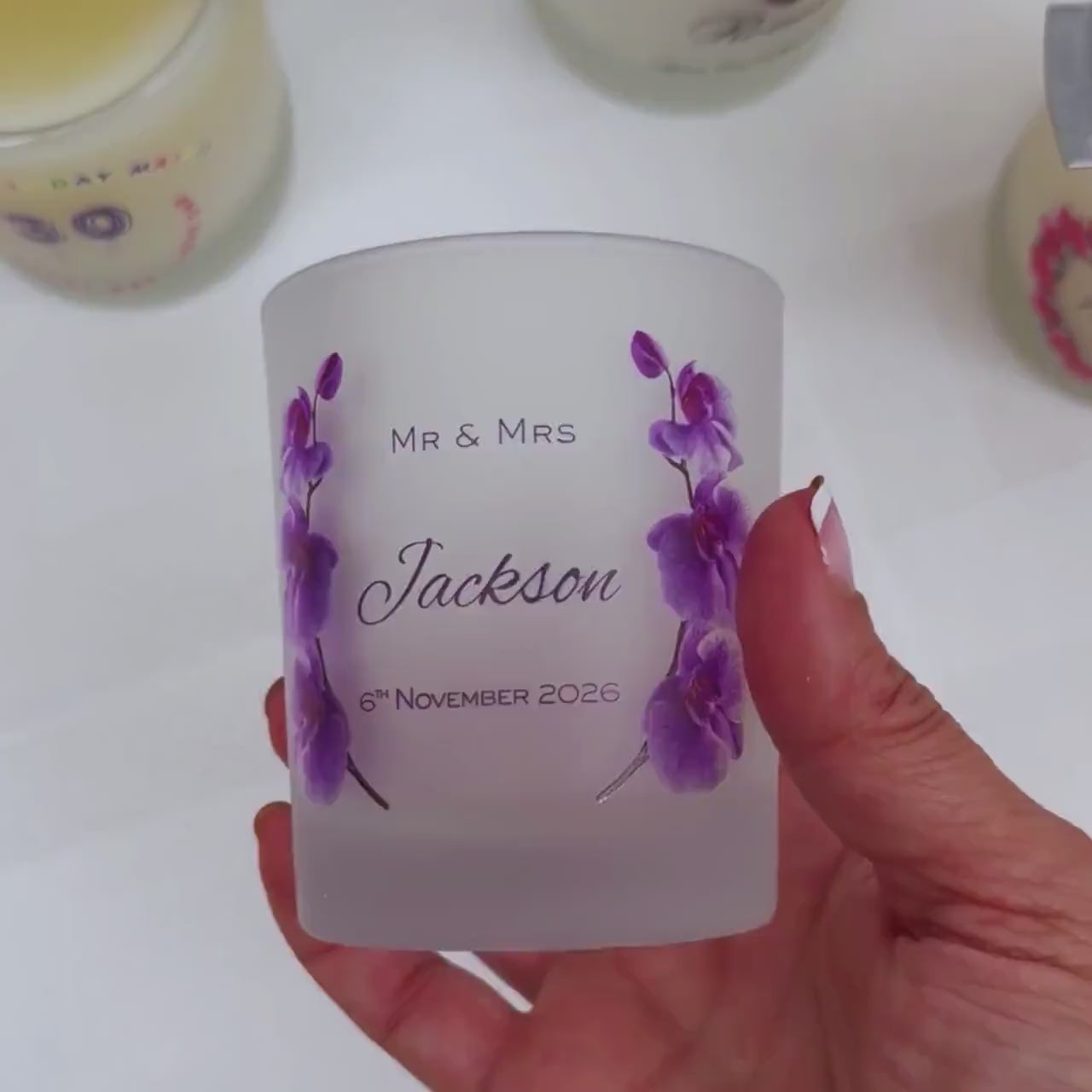 Personalised wedding candle video showing the orchid design and matches bottle