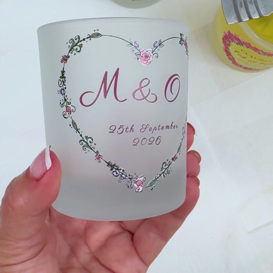Personalised wedding candle video showing the boho floral heart design