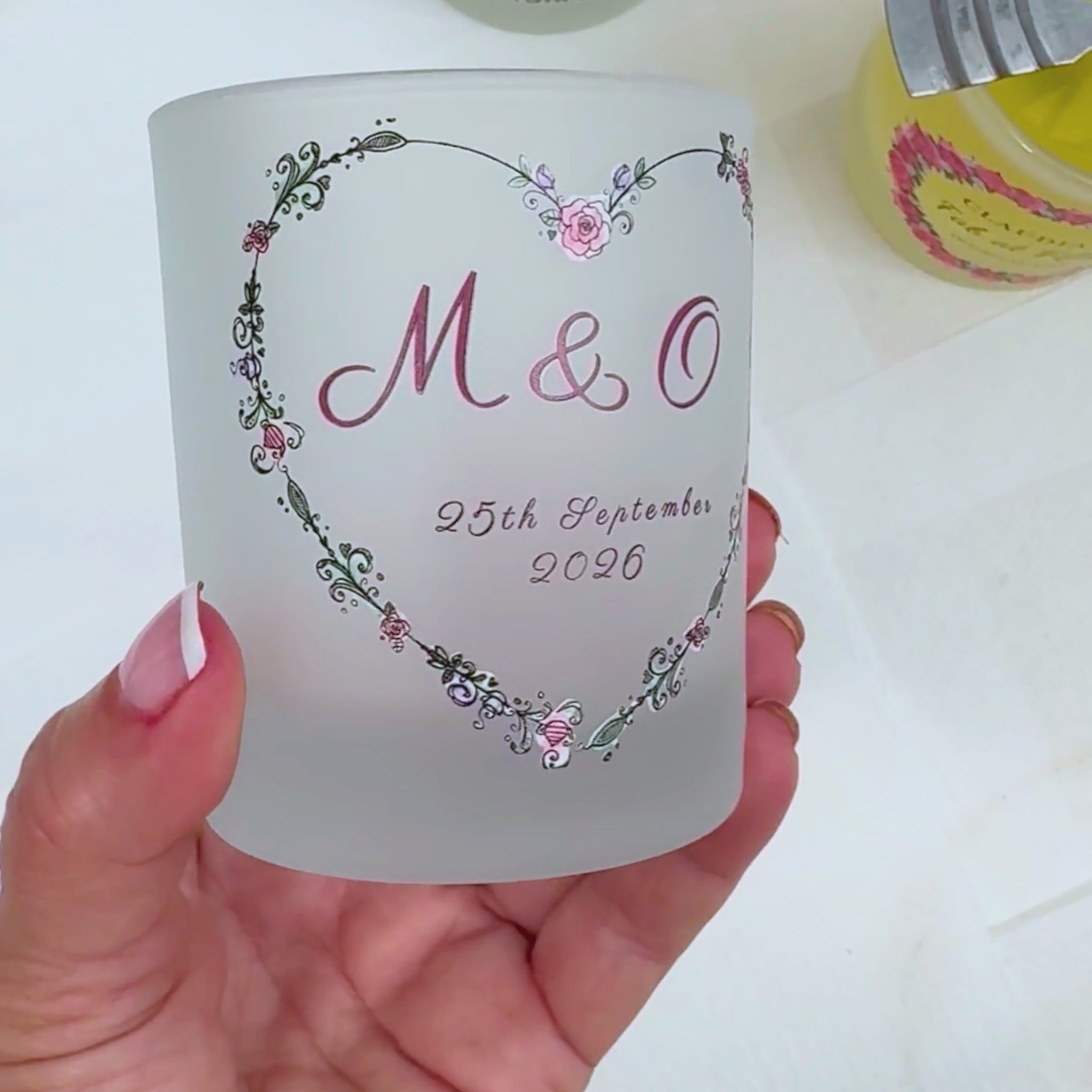 Personalised wedding candle video showing the boho floral heart design