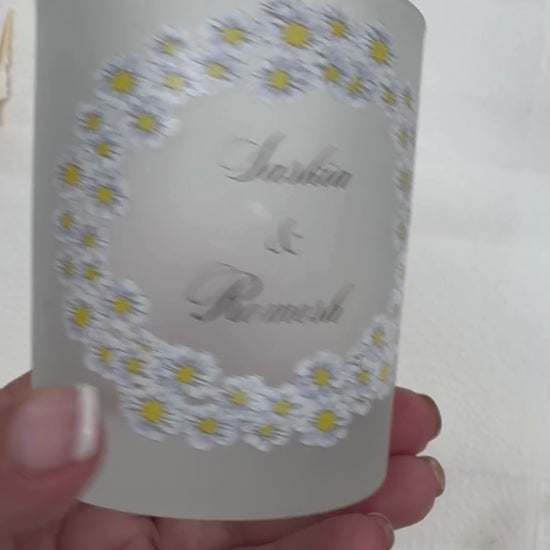 Personalised engagement candle video showing the daisy design and personalisation