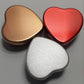 Personalised candle wedding favour in a gold heart tin with natural confetti