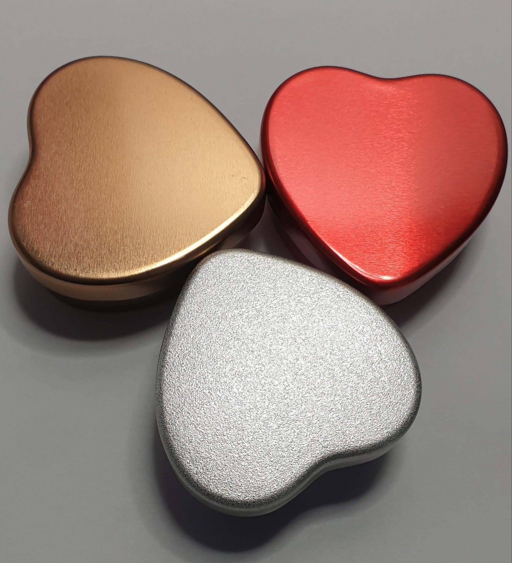 Personalised candle wedding favour in a gold heart tin with natural confetti