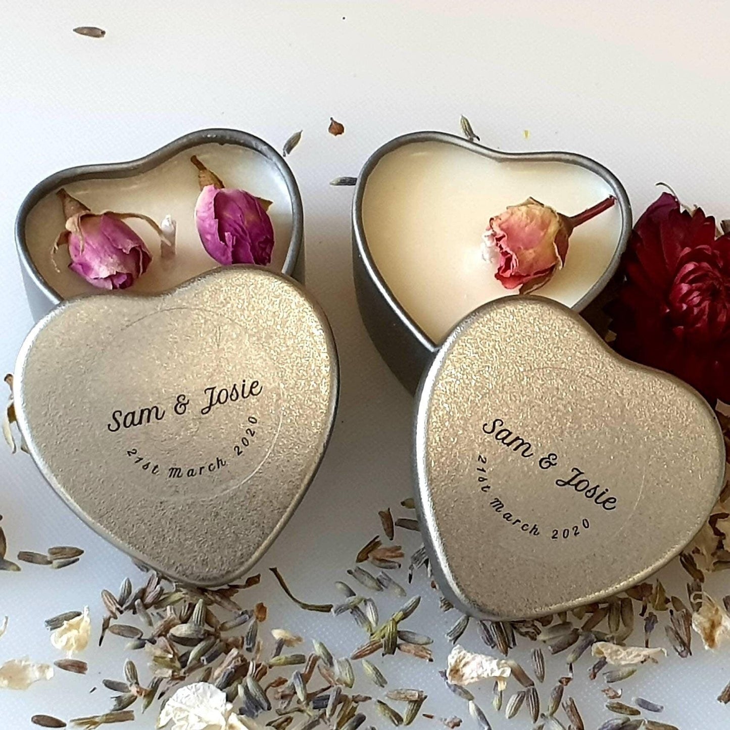 Personalised candle wedding favour in a gold heart tin with natural confetti