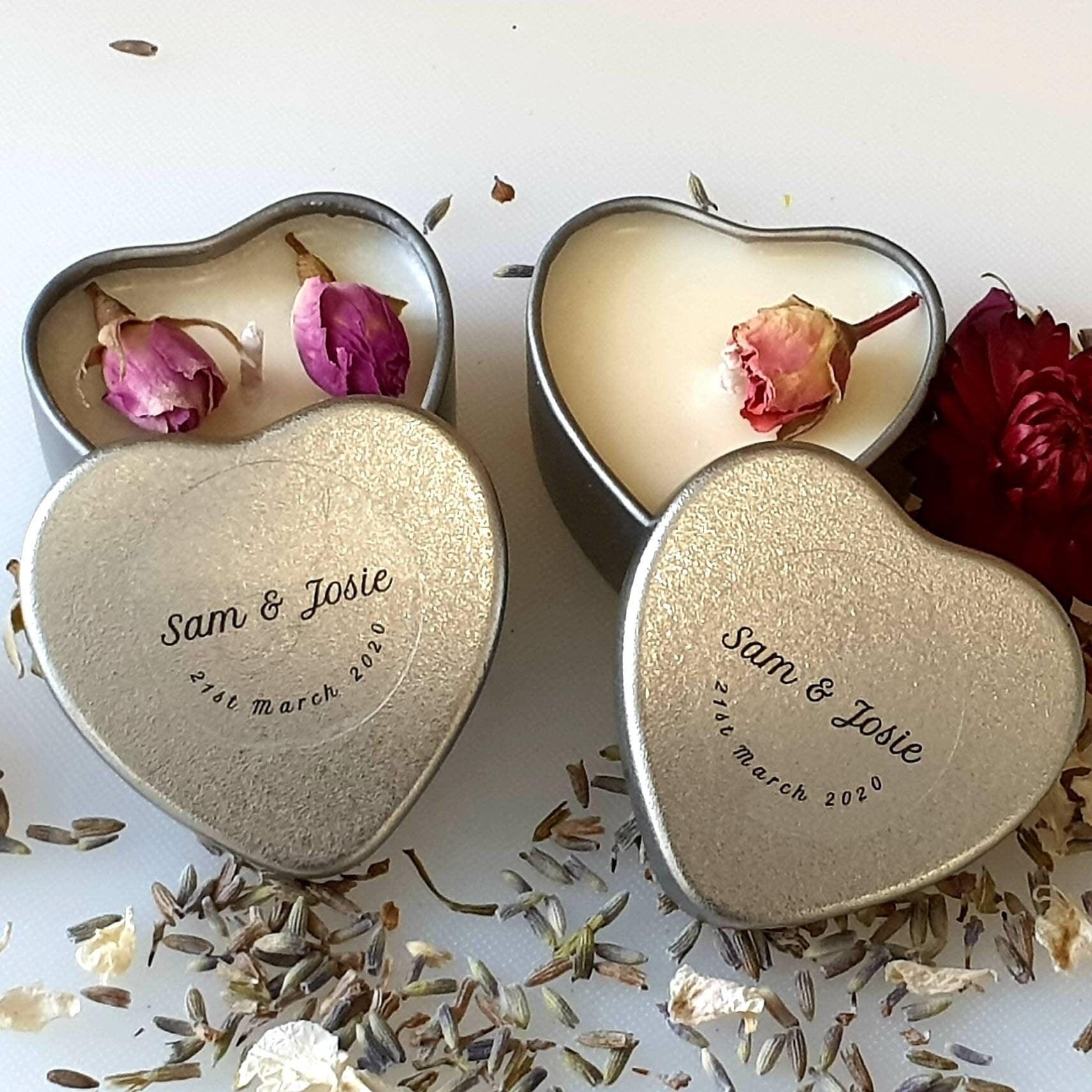Personalised candle wedding favour in a gold heart tin with natural confetti