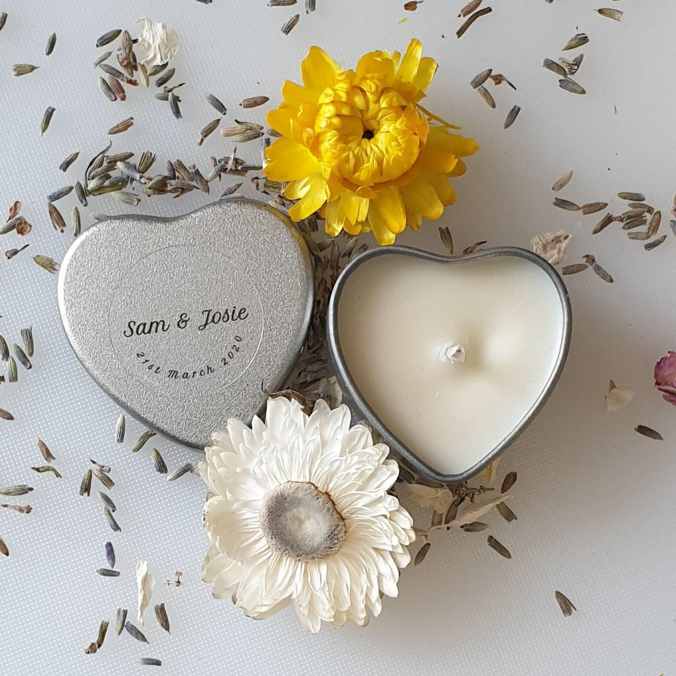 Personalised candle wedding favour in a gold heart tin with natural confetti